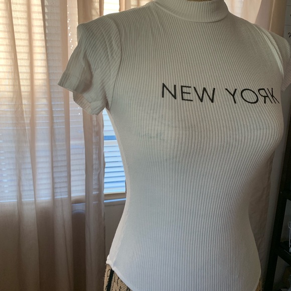 White Shortsleeved Bodysuit. Size small - Picture 3 of 3